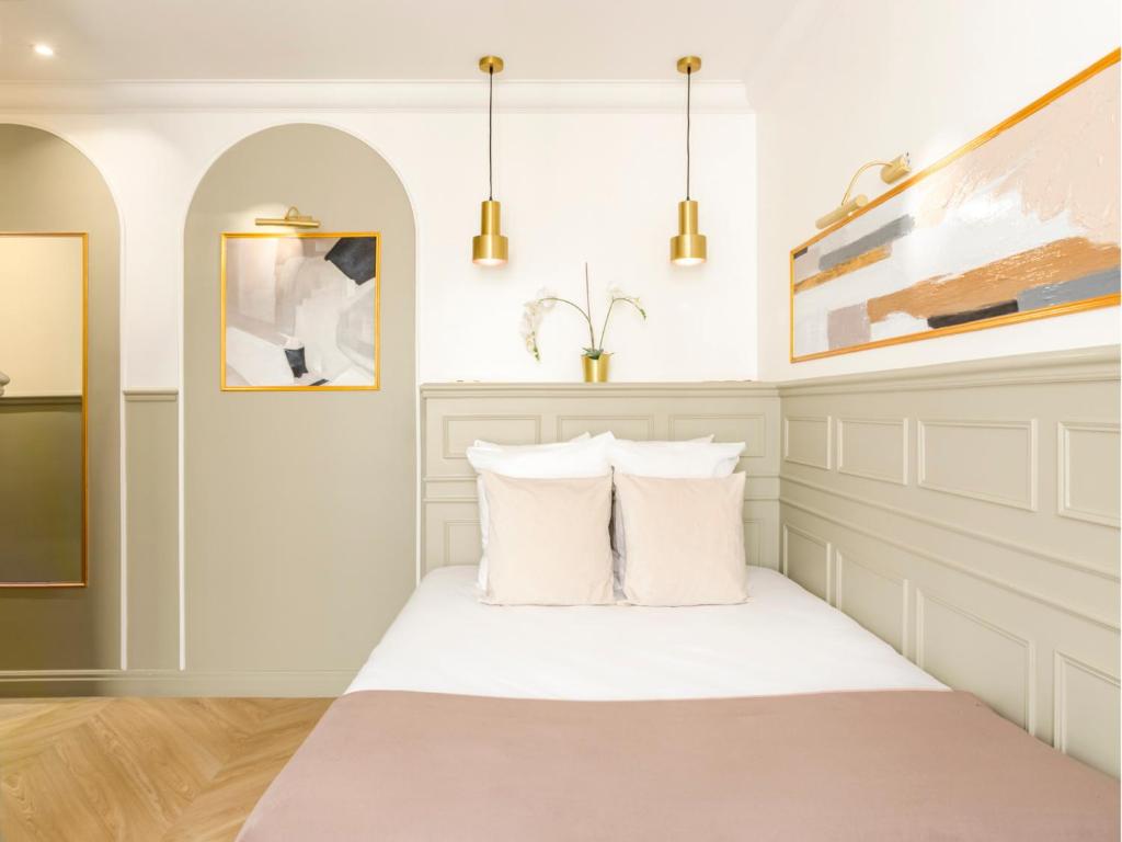 Posteľ alebo postele v izbe v ubytovaní Merveil - Luxury Suite - Louvre - Rousseau