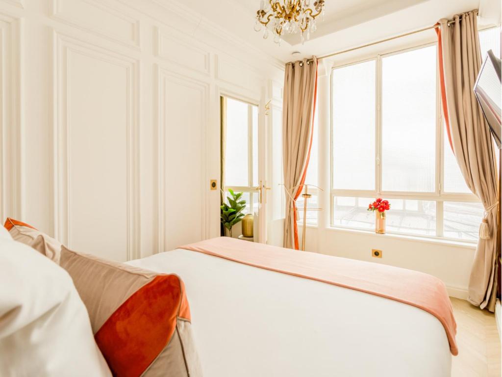 Posteľ alebo postele v izbe v ubytovaní Merveil - Luxury Suite - Louvre - Rousseau