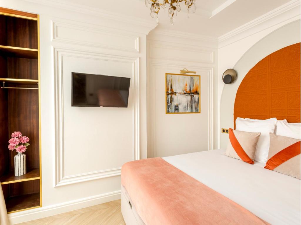 Posteľ alebo postele v izbe v ubytovaní Merveil - Luxury Suite - Louvre - Rousseau