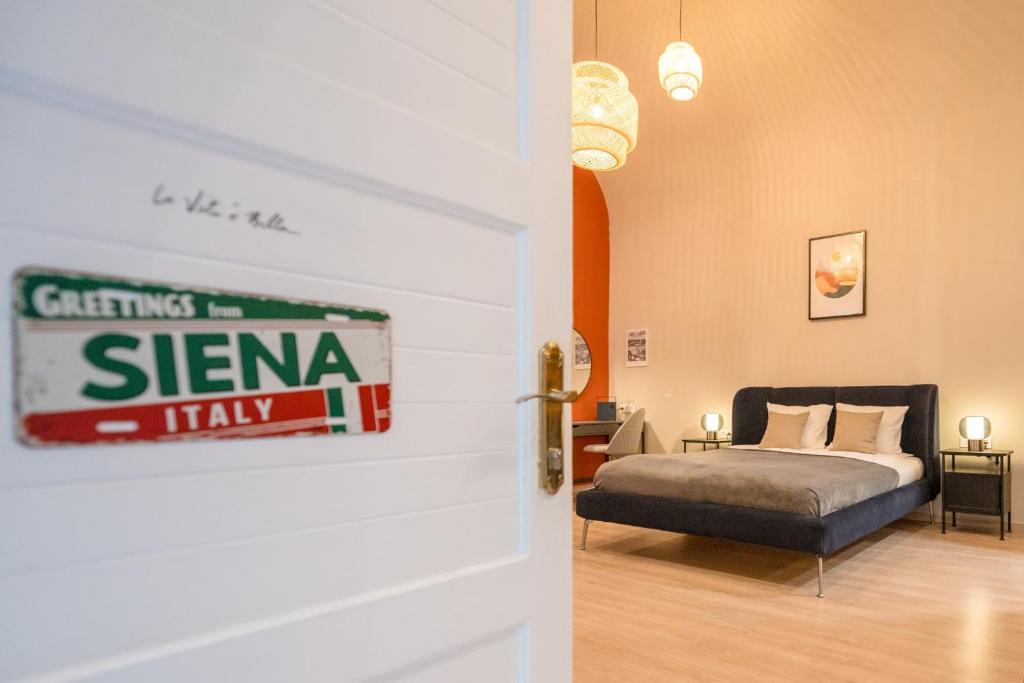 Posteľ alebo postele v izbe v ubytovaní Siena Haven - Urban Suite