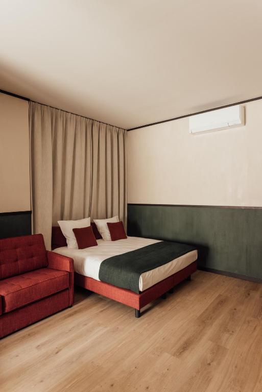 Postel nebo postele na pokoji v ubytování Getaway Studios Liège
