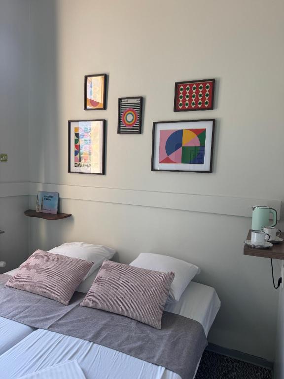 Postel nebo postele na pokoji v ubytování HI Tournai Hostel
