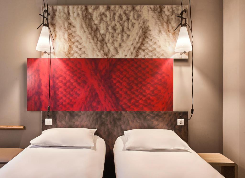 Postel nebo postele na pokoji v ubytování ibis Hotel Hamburg St. Pauli Messe