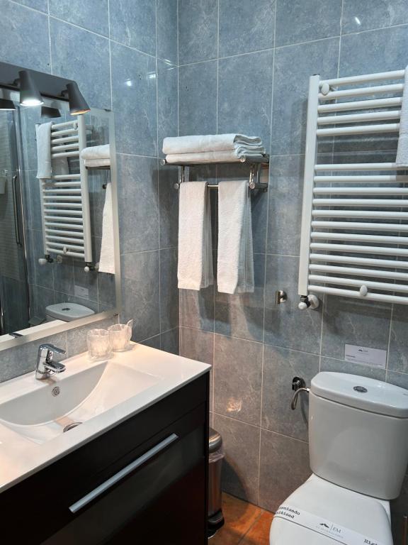 Koupelna v ubytování El Mondalindo Habitación intima con patio