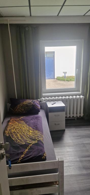 Postel nebo postele na pokoji v ubytování M&R Motel