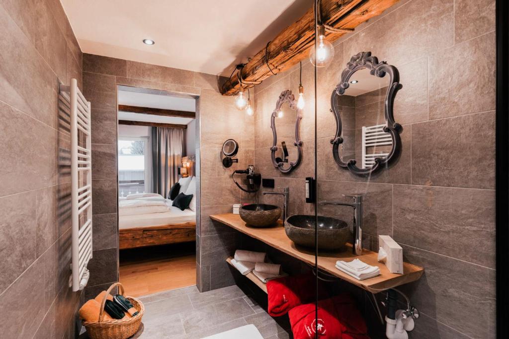 Koupelna v ubytování Hotel Glücksschmiede - Hinterglemm