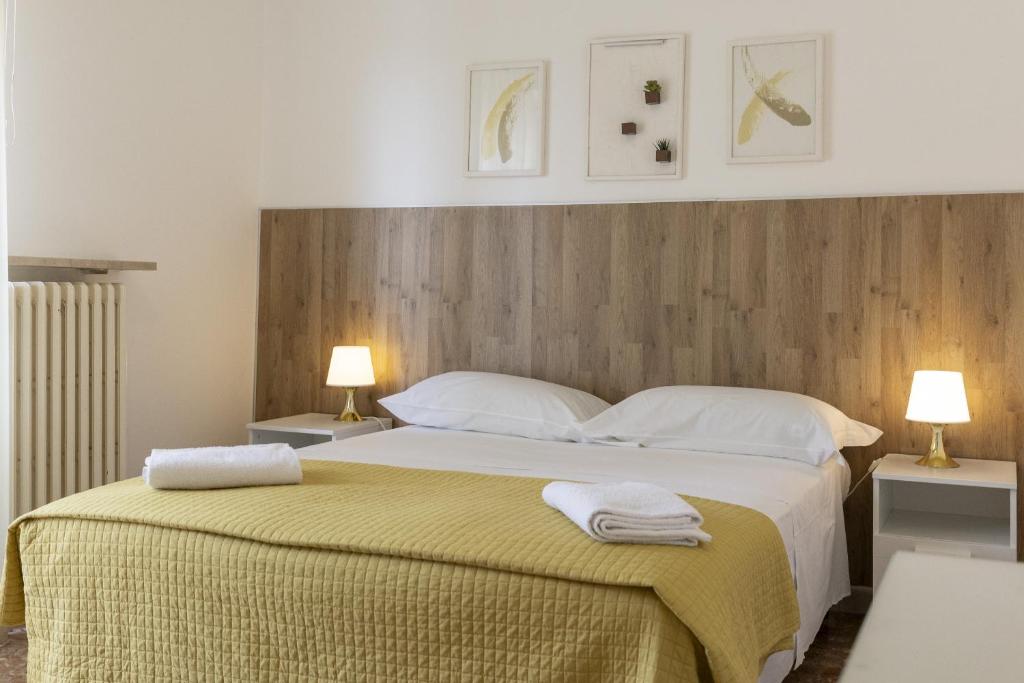 Postel nebo postele na pokoji v ubytování B&B Mariclà