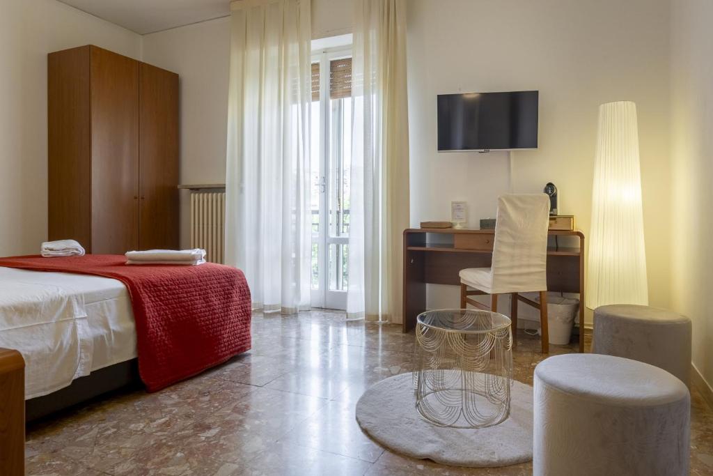 Postel nebo postele na pokoji v ubytování B&B Mariclà