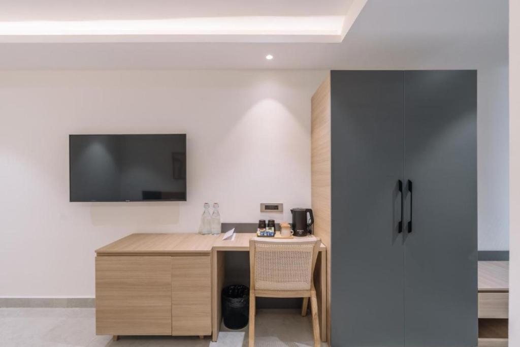 Kuchyň nebo kuchyňský kout v ubytování Hotel D Tark Plaza