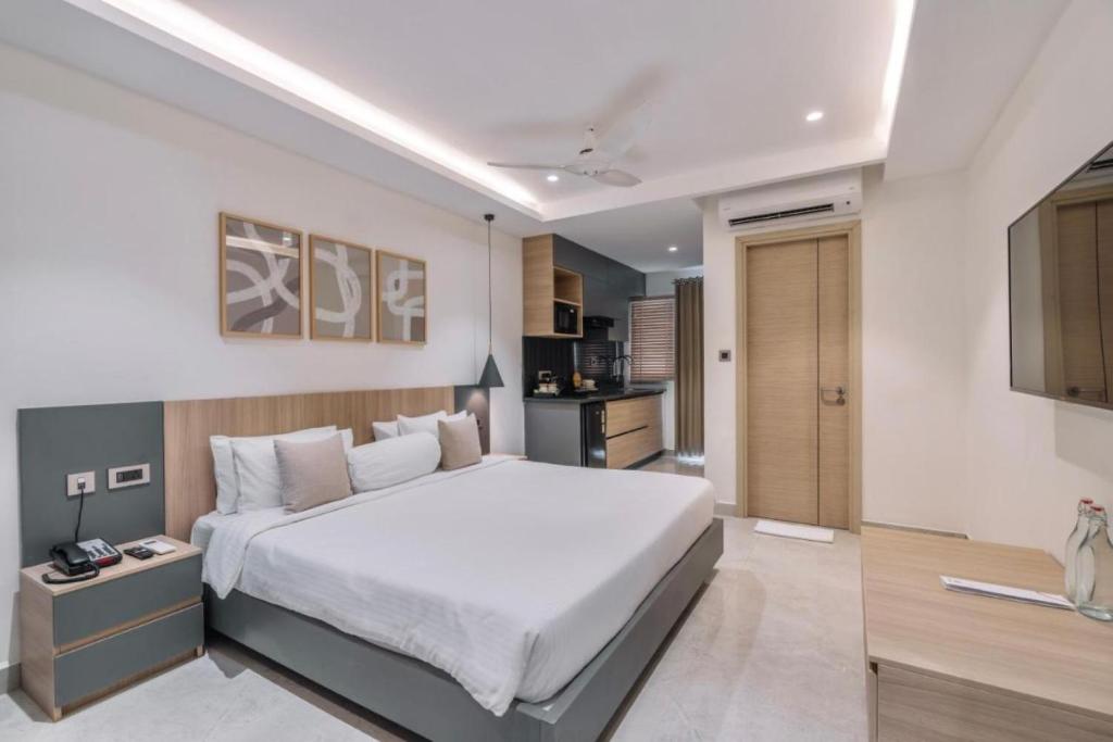 Postel nebo postele na pokoji v ubytování Hotel D Tark Plaza