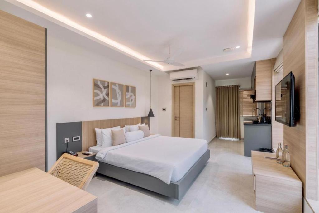 Postel nebo postele na pokoji v ubytování Hotel D Tark Plaza