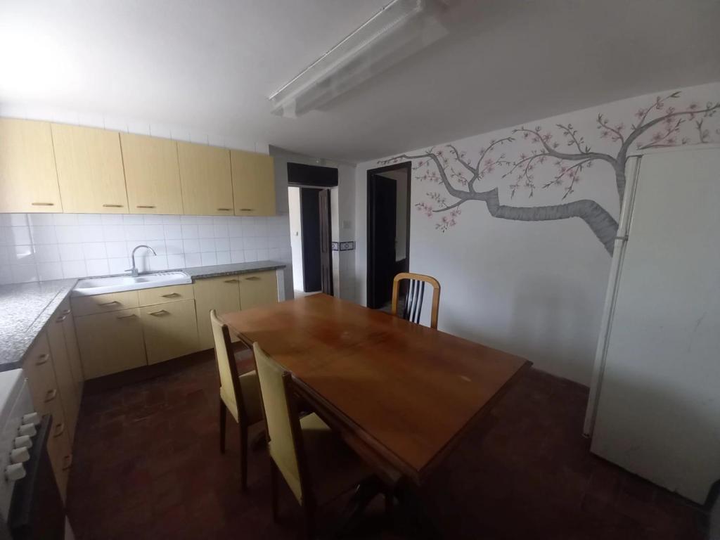 A kitchen or kitchenette at Hostal Rural Mas Blanc