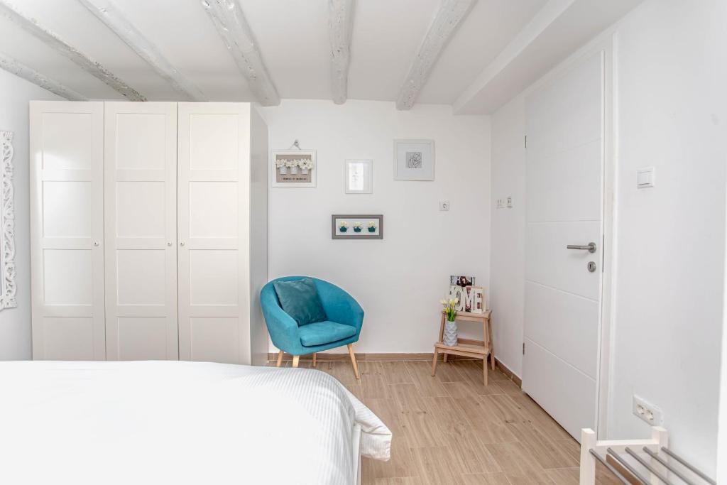 Posteľ alebo postele v izbe v ubytovaní Apartman Dioniz