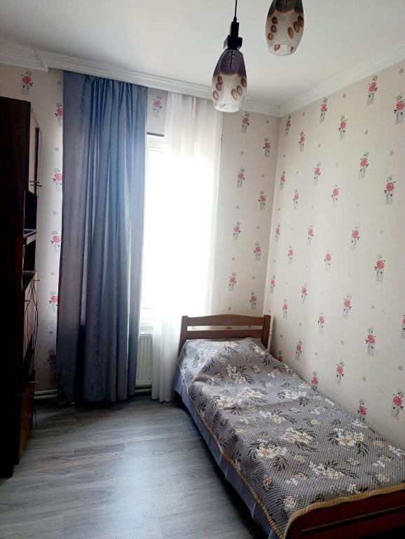 Postel nebo postele na pokoji v ubytování Rest for you - Отдых для тебя