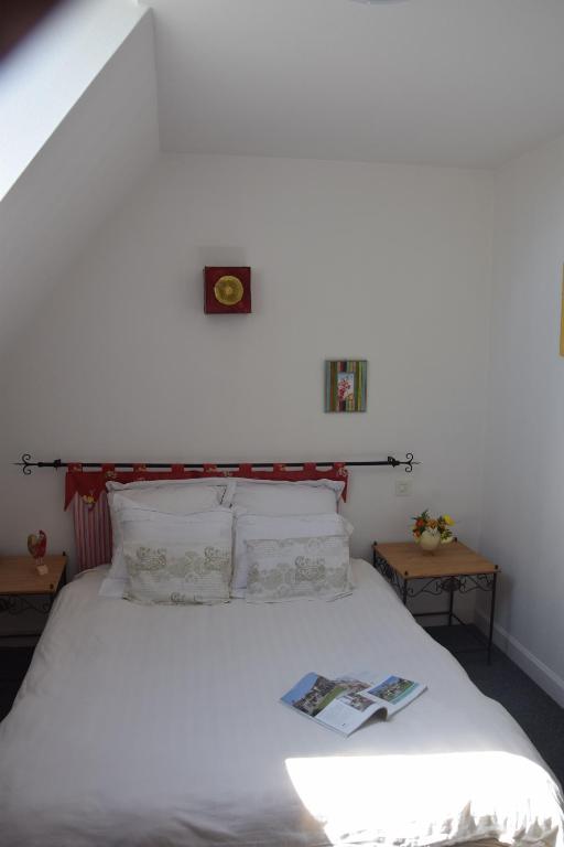 Postel nebo postele na pokoji v ubytování Le Petit Relais