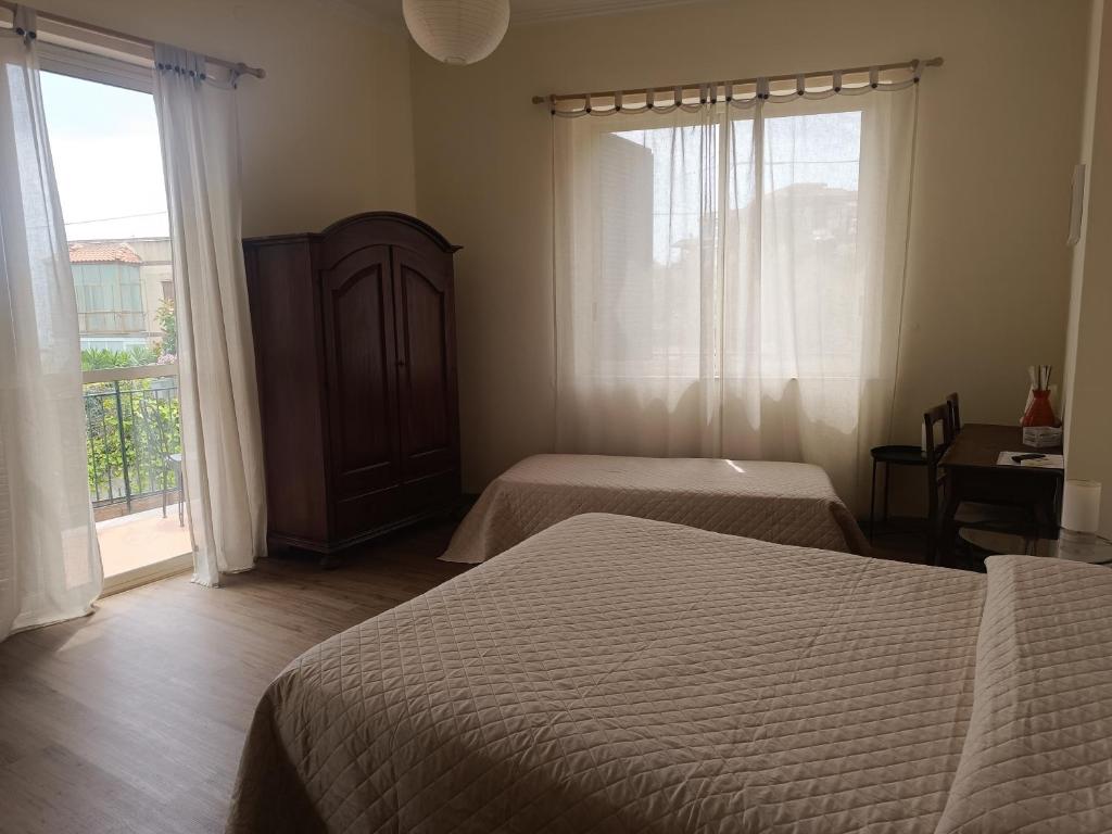 Postel nebo postele na pokoji v ubytování B&B Stella Marina