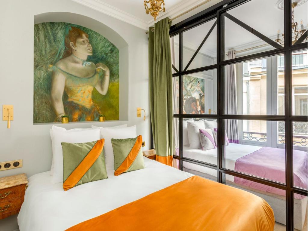 Posteľ alebo postele v izbe v ubytovaní Merveil - Luxury Suite - Louvre - Opera I