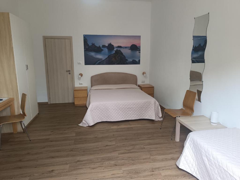 Postel nebo postele na pokoji v ubytování B&B Stella Marina