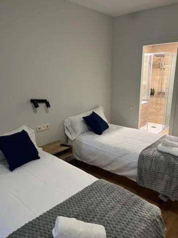 Postel nebo postele na pokoji v ubytování Can Xaran Hotel