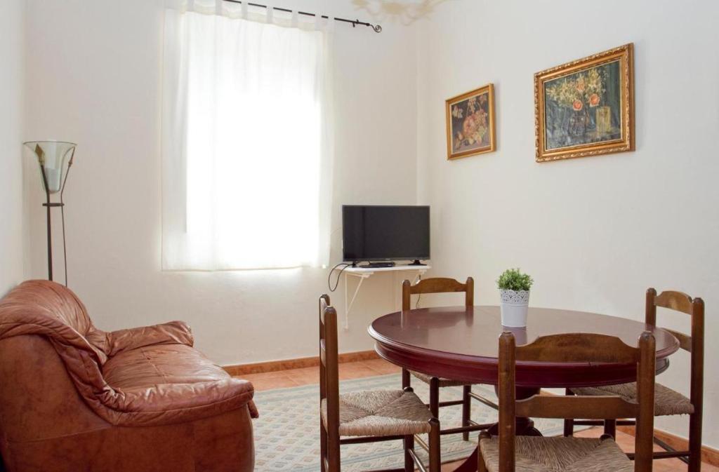 Televízia a/alebo spoločenská miestnosť v ubytovaní Holiday home Can Clerc