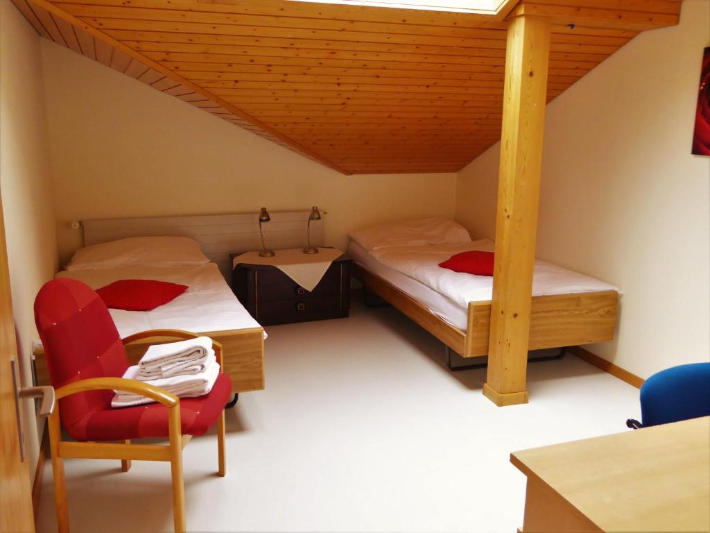 Letto o letti in una camera di Hotel Tell and Apartments