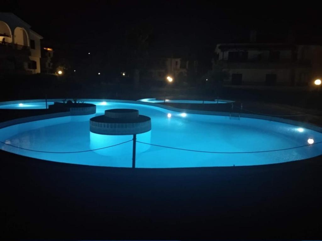 Bazén v ubytování Possidi Pool Nest by Booking Kottas nebo v jeho okolí