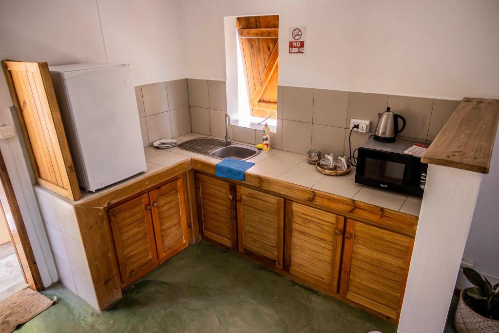 Kuchyň nebo kuchyňský kout v ubytování Auberge St Francois