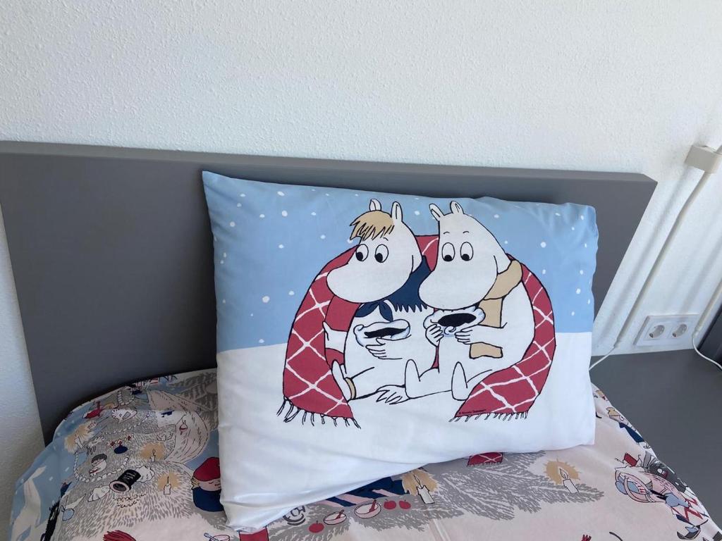Katil atau katil-katil dalam bilik di HELSINKI apartment