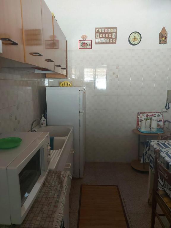 Kuchyň nebo kuchyňský kout v ubytování casa fronte mare puro relax