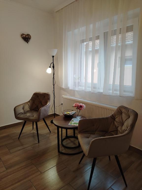 Posezení v ubytování Kaptárkő Apartmanház