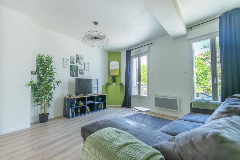 Ένα ή περισσότερα κρεβάτια σε δωμάτιο στο Le Terrazza - T3 hyper-centre avec terrasse privative