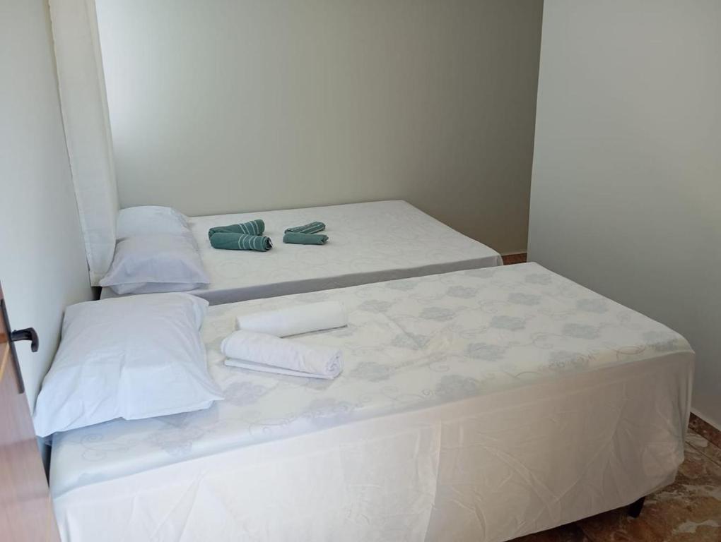 Postel nebo postele na pokoji v ubytování Quartos pra hospedagem em Maragogi