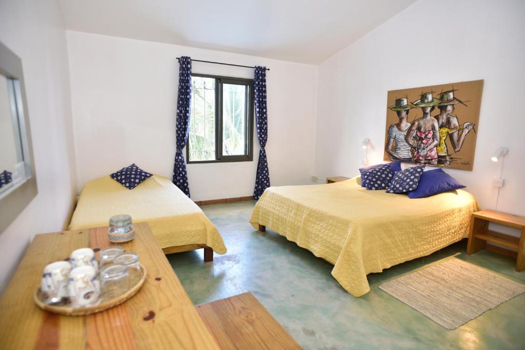 Postel nebo postele na pokoji v ubytování Auberge St Francois