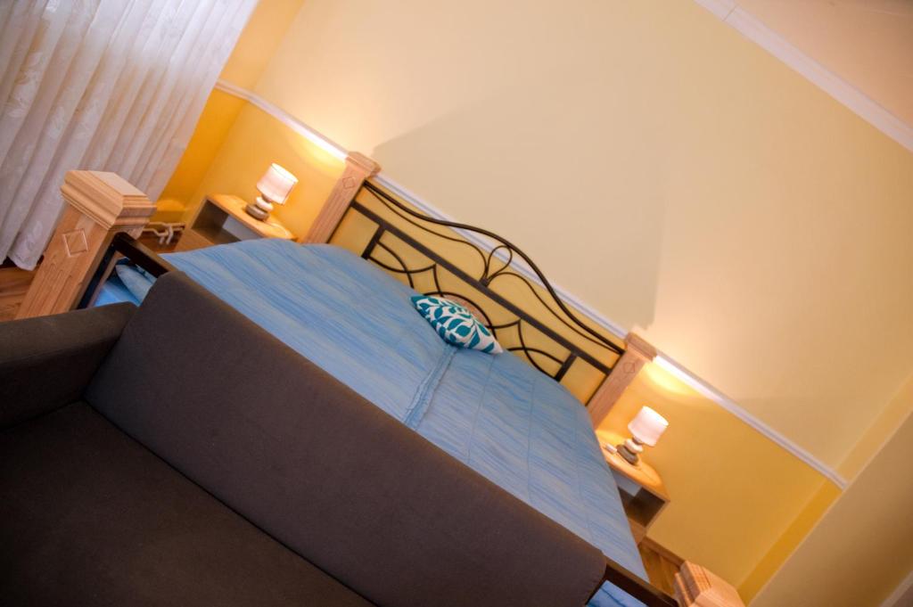 Postel nebo postele na pokoji v ubytování Pension Villa Maria