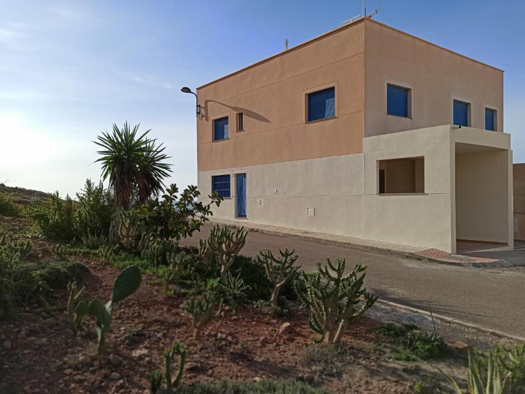 a house on the side of a road at Casa La Fabriquilla en Cabo de Gata, Almería, Spain in Almería
