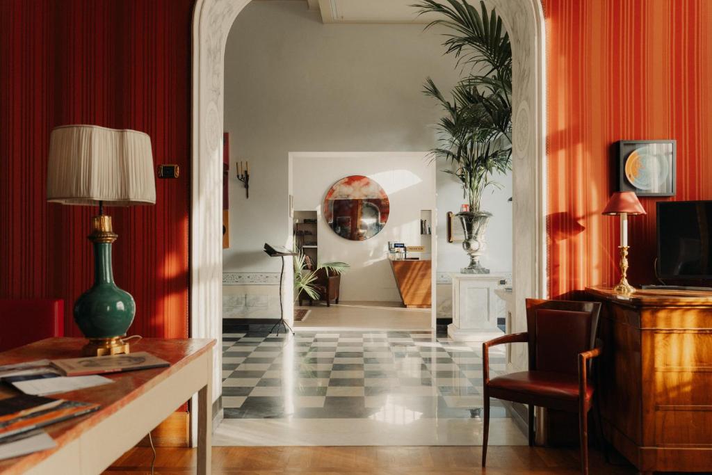 TV a/nebo společenská místnost v ubytování Hotel Palazzo Guiscardo Pietrasanta