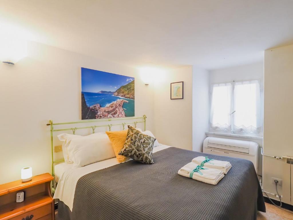 Postel nebo postele na pokoji v ubytování Mainetta Sea View Apartment with AC
