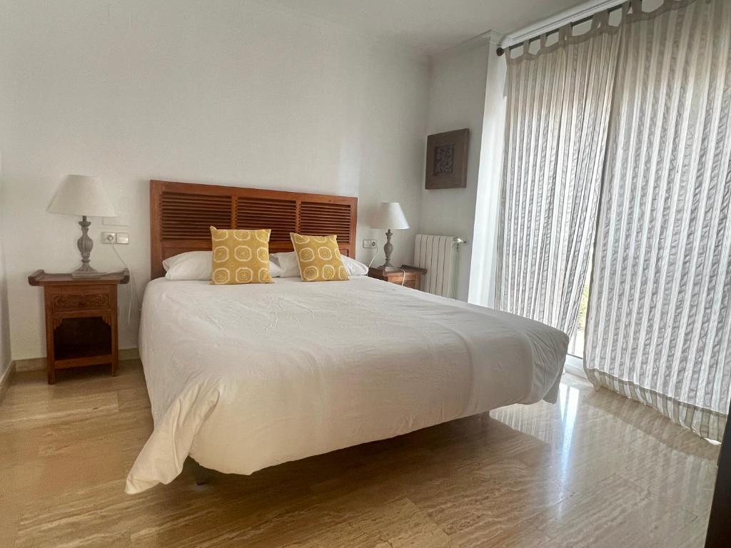 Postel nebo postele na pokoji v ubytování Residencia La Mina - Albir