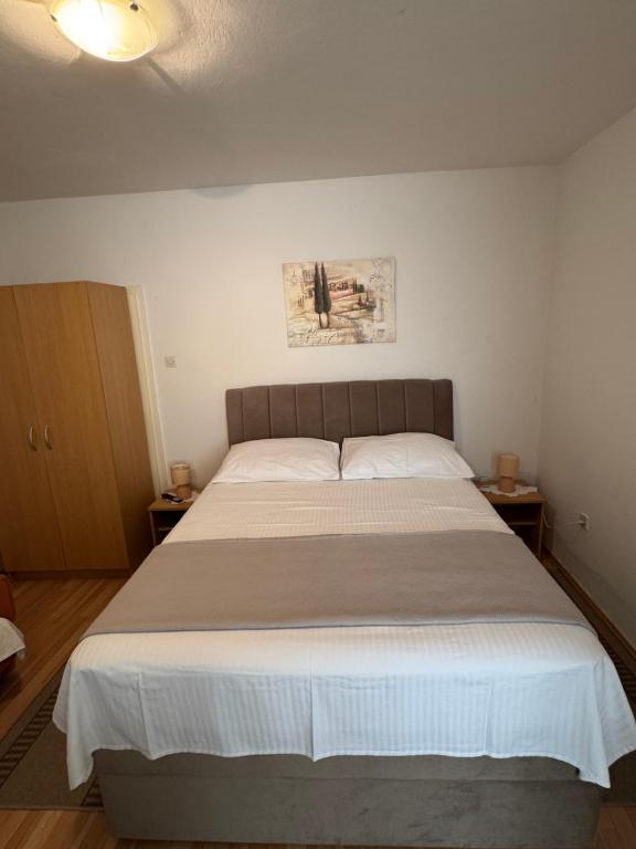 Posteľ alebo postele v izbe v ubytovaní Apartments Miše