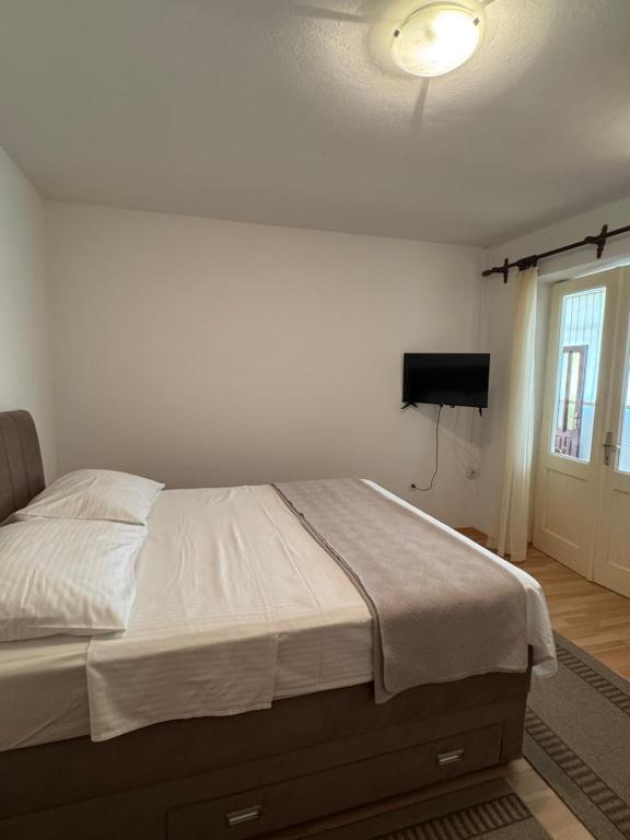 Posteľ alebo postele v izbe v ubytovaní Apartments Miše