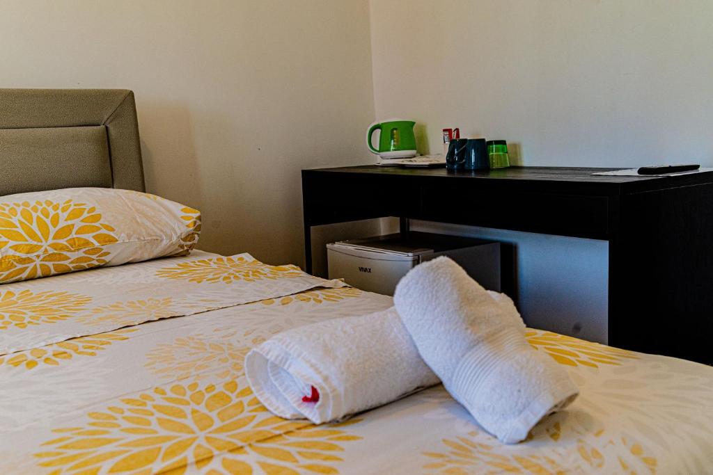 Voodi või voodid majutusasutuse Rooms & Apartments Mirakul toas