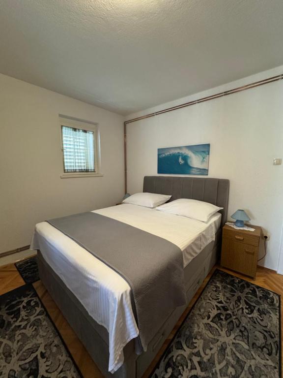 Posteľ alebo postele v izbe v ubytovaní Apartments Miše
