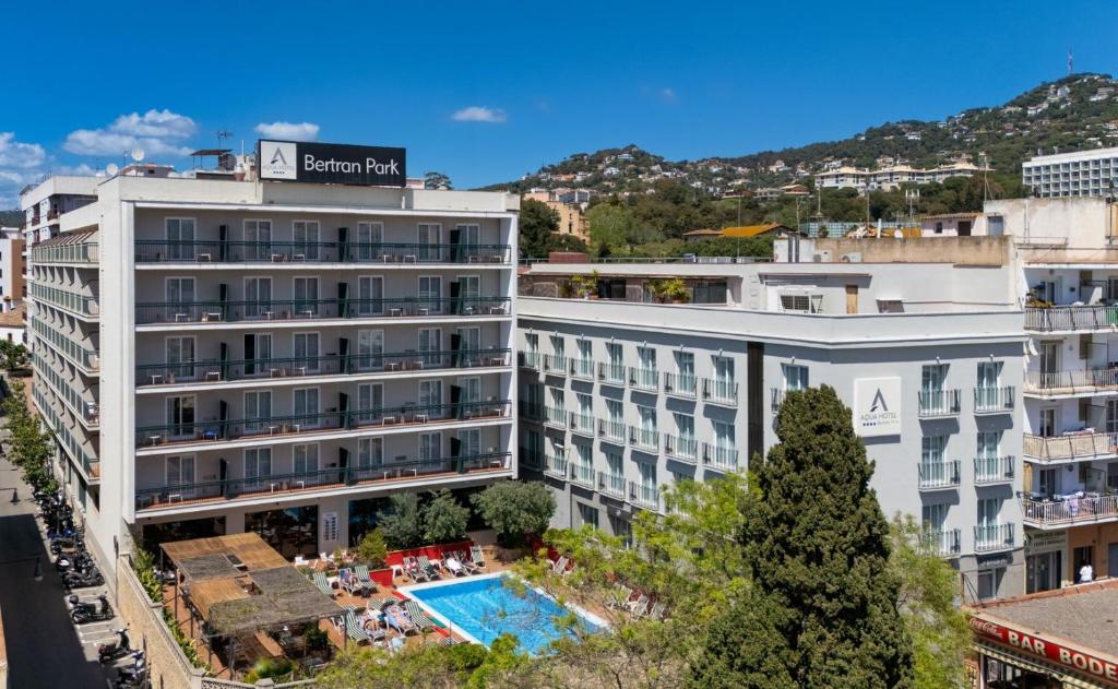 an aerial view of a hotel with a swimming pool at AQUA Hotel Bertran Park in Lloret de Mar
