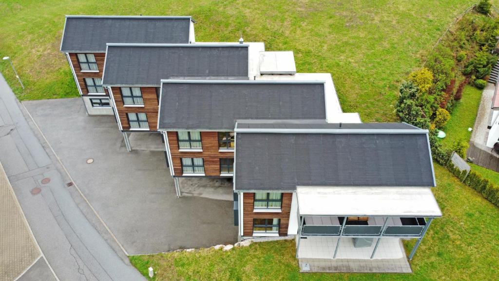 an overhead view of a group of buildings at LEHNER Panorama Alpensuiten in Berwang