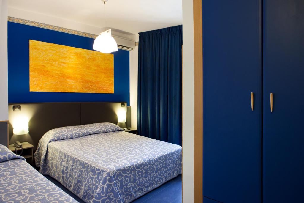 Postel nebo postele na pokoji v ubytování Hotel Côte D'Est