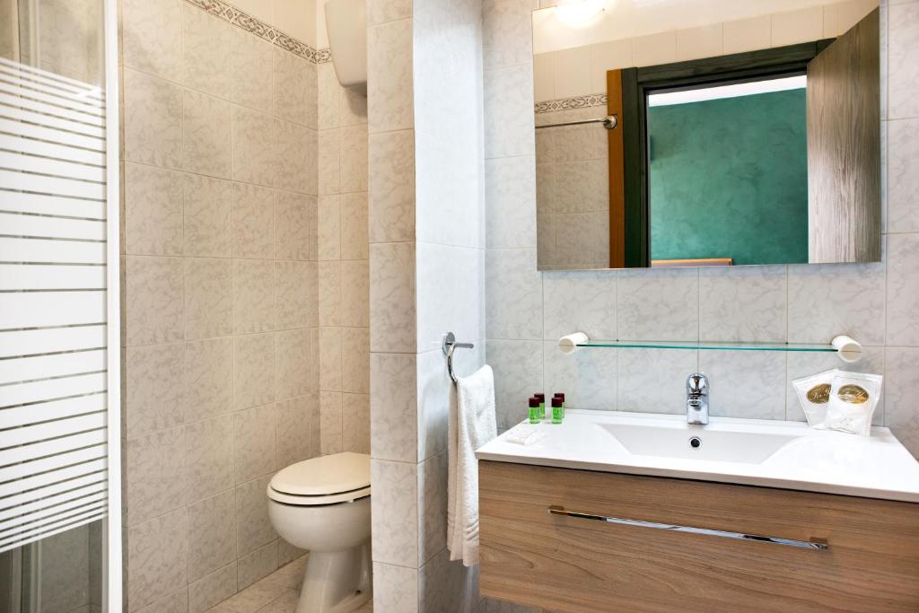 Koupelna v ubytování Hotel Côte D'Est