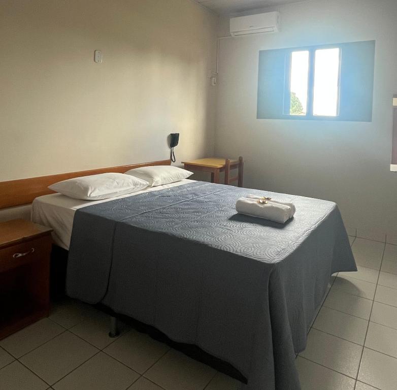 Postel nebo postele na pokoji v ubytování Hotel Águia