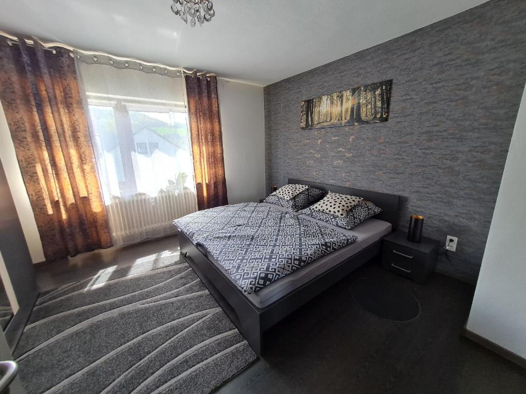 Postel nebo postele na pokoji v ubytování Ferienwohnung Zum Hasen