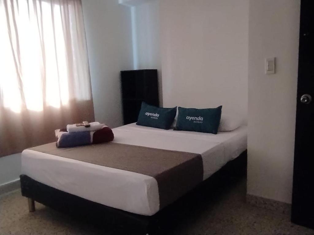 Postel nebo postele na pokoji v ubytování Hotel JC 43