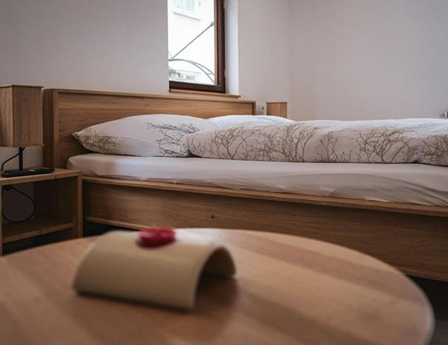 Postel nebo postele na pokoji v ubytování Pension Goldener Zwinger